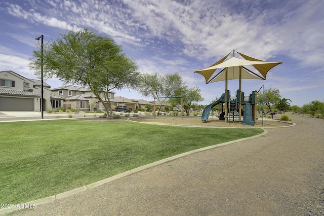 view of playground featuring a lawn