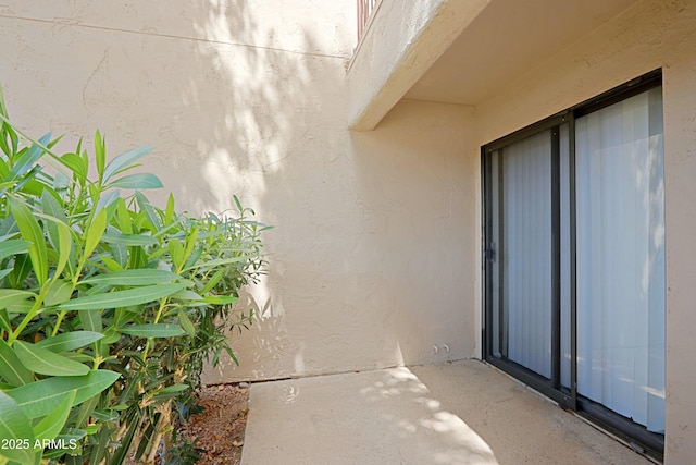 9355 N 91st St Unit 116, Scottsdale, AZ 85258 - doorway to property featuring stucco siding