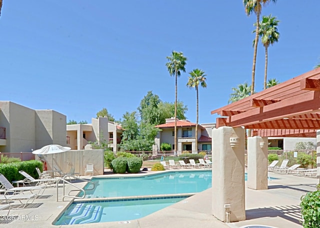 9355 N 91st St Unit 116, Scottsdale, AZ 85258 - pool featuring a pergola, a patio, and fence