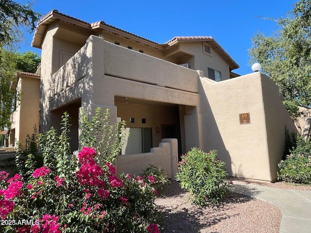 exterior space featuring a balcony