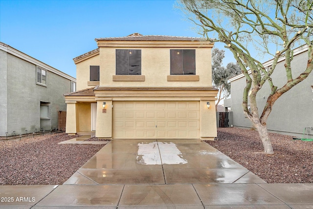 view of front of home with a garage