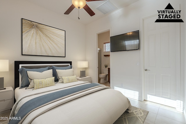 bedroom featuring connected bathroom, ceiling fan, and light tile patterned flooring