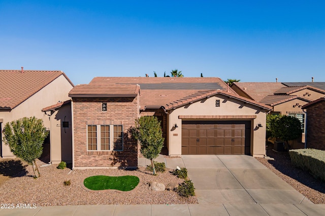 ranch-style house featuring a garage