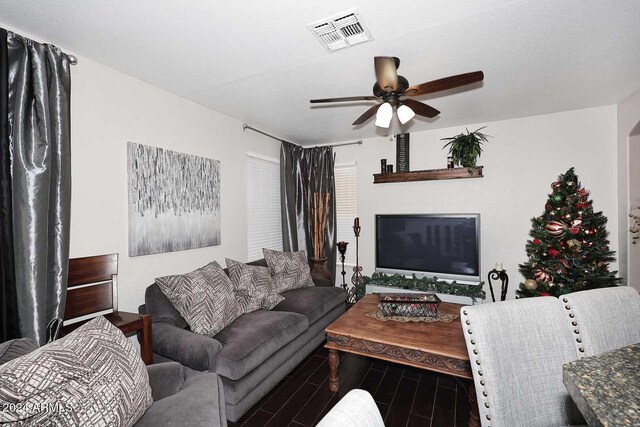 living room featuring ceiling fan