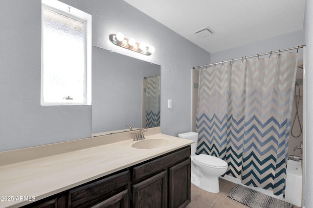 bathroom featuring shower / bath combo, visible vents, toilet, tile patterned floors, and vanity