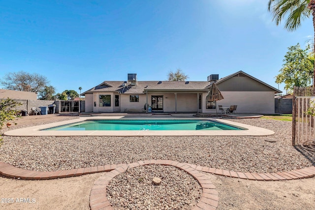 view of swimming pool featuring a patio area, a fenced backyard, and a fenced in pool