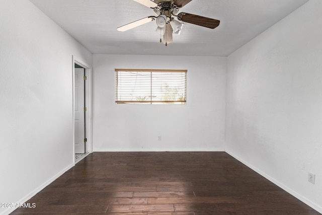 unfurnished room featuring wood finished floors, ceiling fan, and baseboards