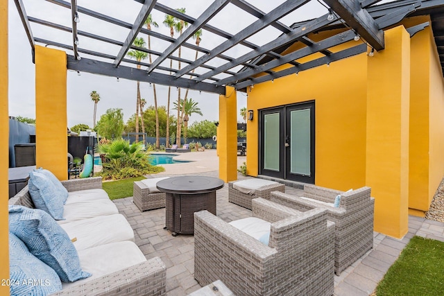 view of patio featuring an outdoor pool, an outdoor hangout area, a pergola, and french doors