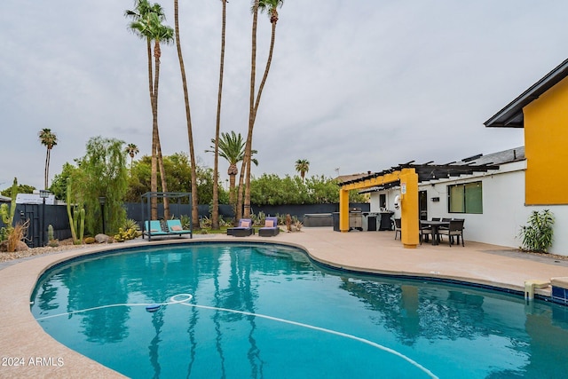 view of pool featuring a patio area, a fenced backyard, a fenced in pool, and a pergola