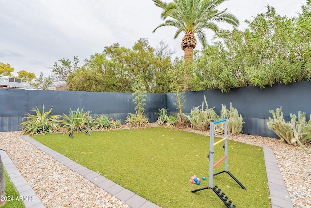 view of yard with a fenced backyard