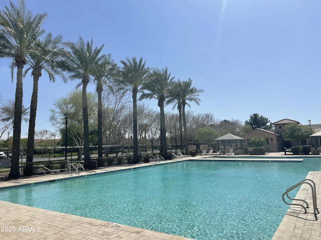 1161 S Storment Ln, Gilbert, AZ 85296 - pool featuring a patio and fence