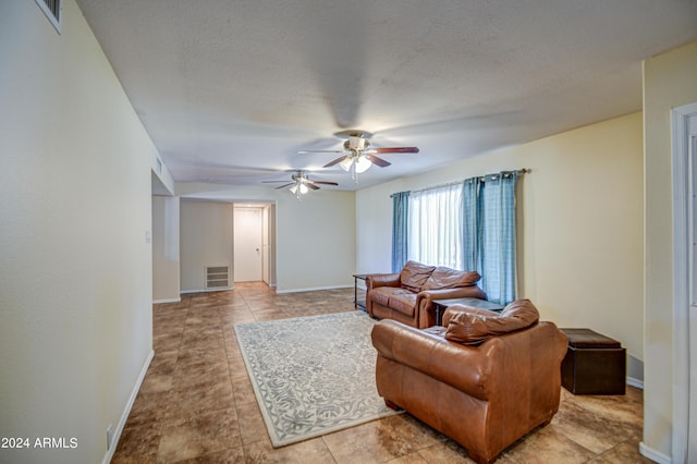 living room featuring ceiling fan