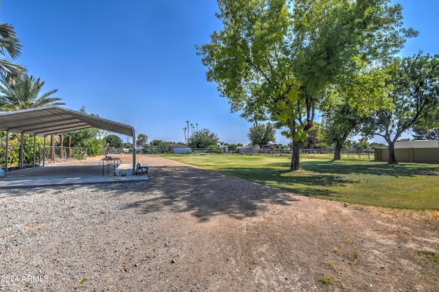 view of yard featuring a carport