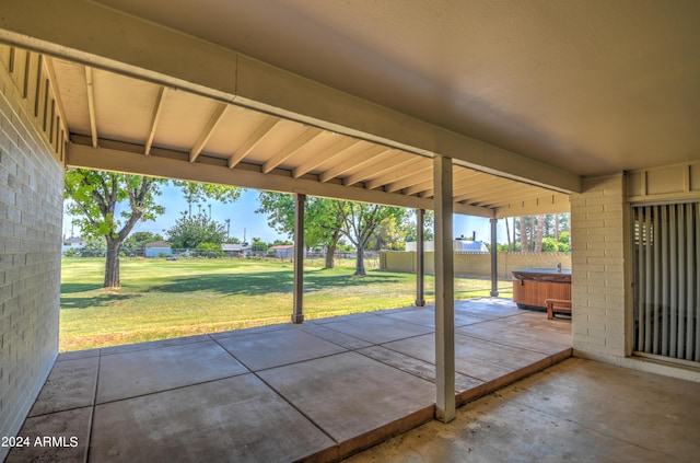 view of patio featuring a hot tub