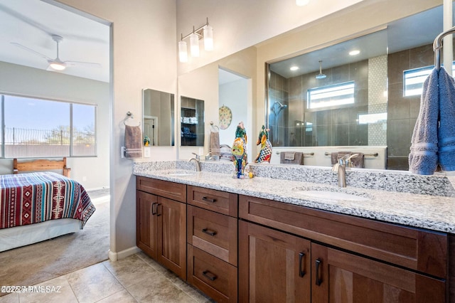 full bath featuring plenty of natural light, ensuite bathroom, and a sink