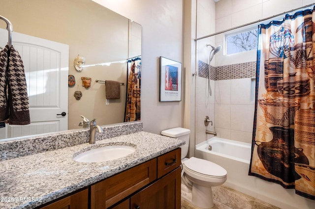 full bathroom with vanity, toilet, and shower / bath combo