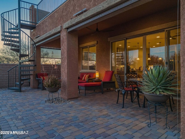 view of patio / terrace featuring stairs