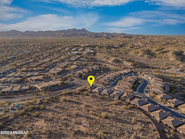 aerial view featuring a mountain view and a residential view