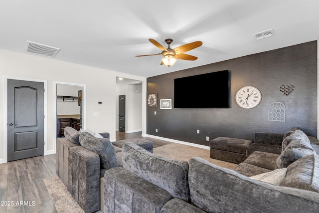 23886 W Harrison Dr, Buckeye, AZ 85326 - living area with a ceiling fan and wood finished floors