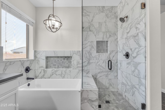 23886 W Harrison Dr, Buckeye, AZ 85326 - bathroom with a chandelier, a bath, a shower stall, and vanity