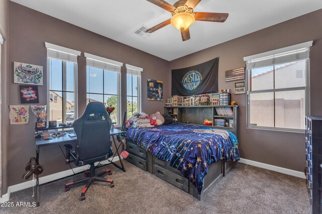 23886 W Harrison Dr, Buckeye, AZ 85326 - carpeted bedroom with a desk and a ceiling fan