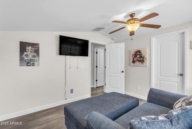 23886 W Harrison Dr, Buckeye, AZ 85326 - living room featuring a ceiling fan, dark wood-style floors, and vaulted ceiling