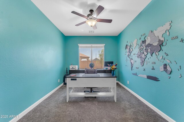23886 W Harrison Dr, Buckeye, AZ 85326 - carpeted office featuring a ceiling fan and baseboards