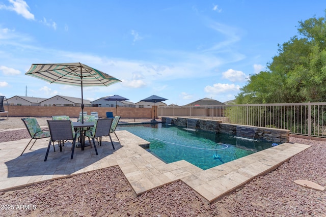 23886 W Harrison Dr, Buckeye, AZ 85326 - view of swimming pool featuring a fenced backyard, a patio area, and outdoor dining area