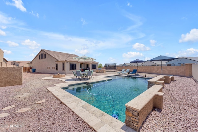 23886 W Harrison Dr, Buckeye, AZ 85326 - view of swimming pool featuring a patio and a fenced backyard