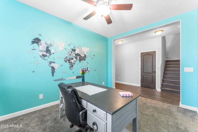 23886 W Harrison Dr, Buckeye, AZ 85326 - home office with ceiling fan, dark wood-style floors, and dark carpet