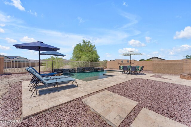 23886 W Harrison Dr, Buckeye, AZ 85326 - view of swimming pool featuring a patio area and a fenced backyard