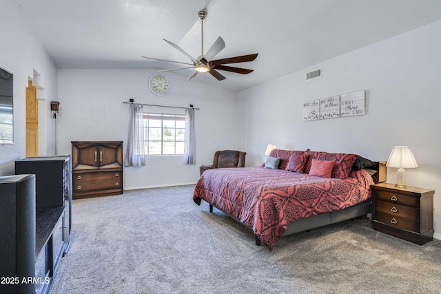 carpeted bedroom featuring ceiling fan, visible vents, vaulted ceiling, and baseboards