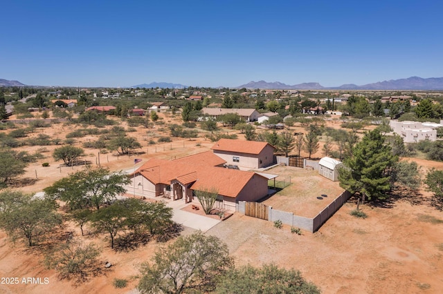 drone / aerial view featuring a mountain view