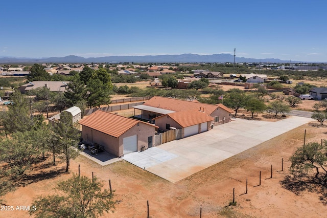 bird's eye view with a residential view and a mountain view