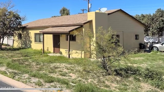 9054 E Crescent Ave, Mesa, AZ 85208 - view of front facade featuring stucco siding