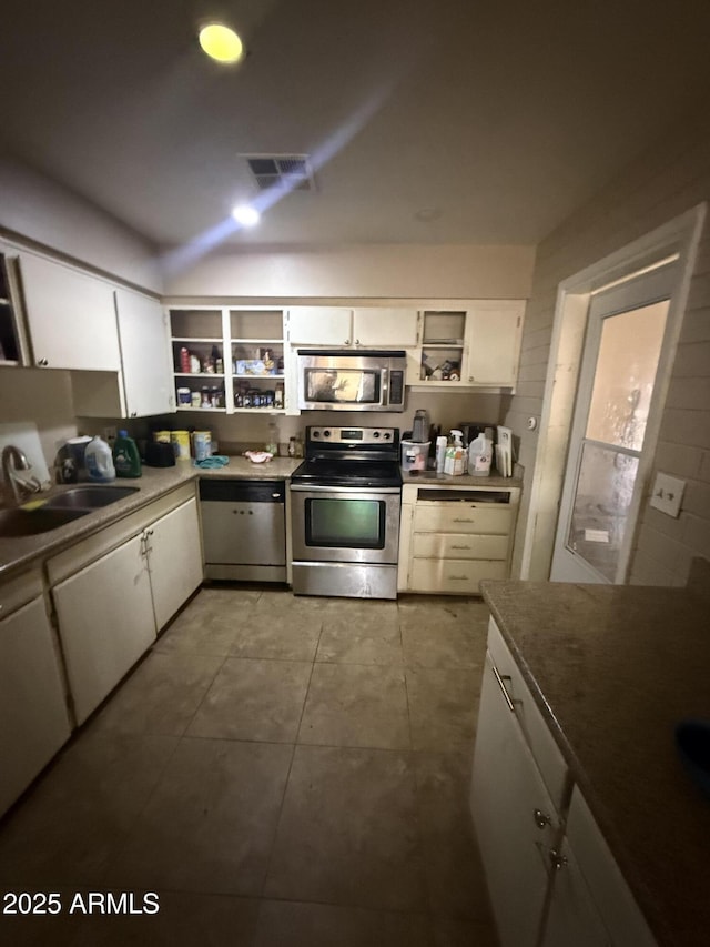 9054 E Crescent Ave, Mesa, AZ 85208 - kitchen featuring stainless steel appliances, open shelves, a sink, and white cabinets
