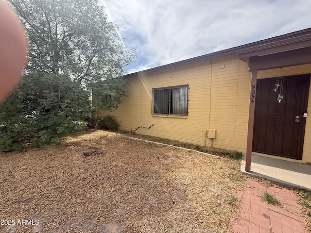 9054 E Crescent Ave, Mesa, AZ 85208 - view of side of home featuring brick siding