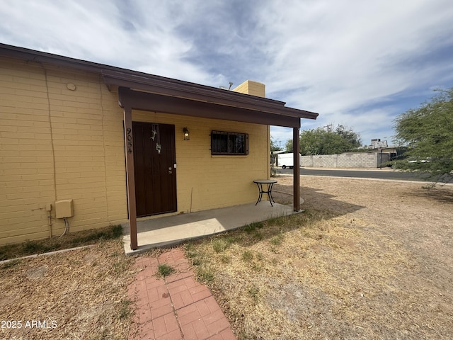 9054 E Crescent Ave, Mesa, AZ 85208 - doorway to property with a chimney