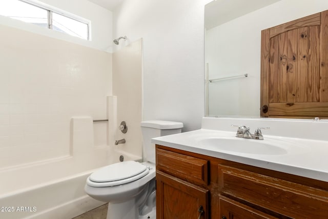7340 W Meadowbrook Ave, Phoenix, AZ 85033 - bathroom featuring vanity, toilet, and tub / shower combination