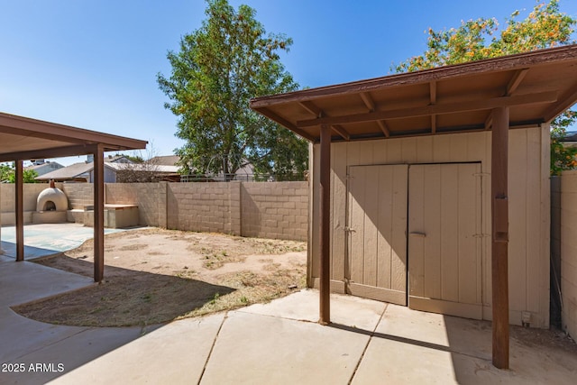 7340 W Meadowbrook Ave, Phoenix, AZ 85033 - fenced backyard with a patio