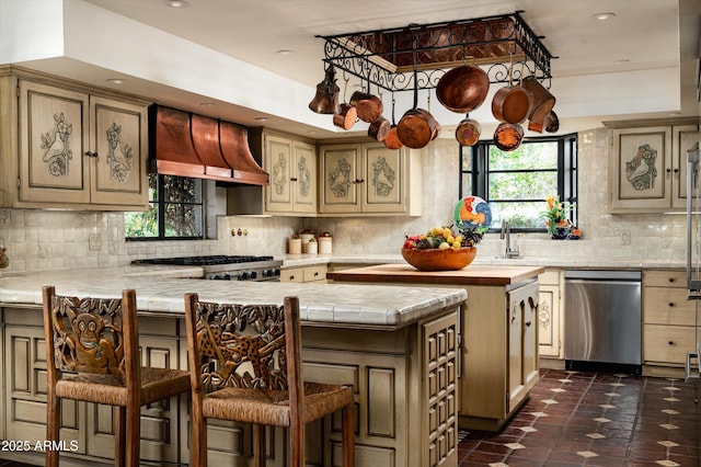 4316 N 40th St, Phoenix, AZ 85018 - kitchen with stainless steel dishwasher, premium range hood, plenty of natural light, a peninsula, and recessed lighting