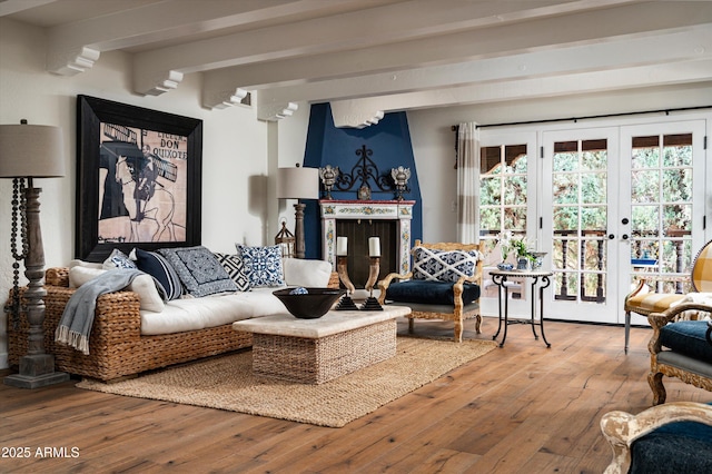 4316 N 40th St, Phoenix, AZ 85018 - living area with wood-type flooring, french doors, healthy amount of natural light, and beam ceiling