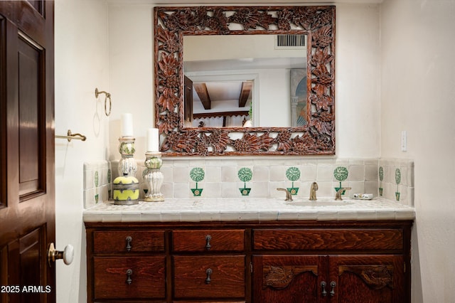 4316 N 40th St, Phoenix, AZ 85018 - bathroom featuring tasteful backsplash and vanity