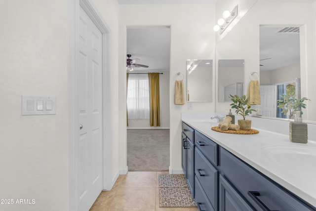 11159 E Sebring Ave, Mesa, AZ 85212 - full bath featuring double vanity, a ceiling fan, tile patterned floors, and healthy amount of natural light