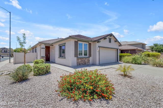 11159 E Sebring Ave, Mesa, AZ 85212 - ranch-style house with an attached garage, stucco siding, and driveway