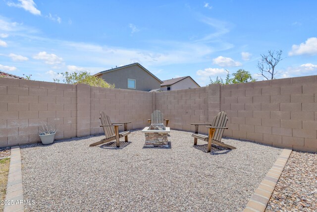 11159 E Sebring Ave, Mesa, AZ 85212 - fenced backyard with an outdoor fire pit