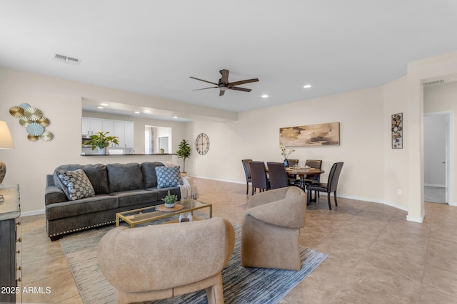 11159 E Sebring Ave, Mesa, AZ 85212 - living area with recessed lighting, a ceiling fan, and light tile patterned flooring