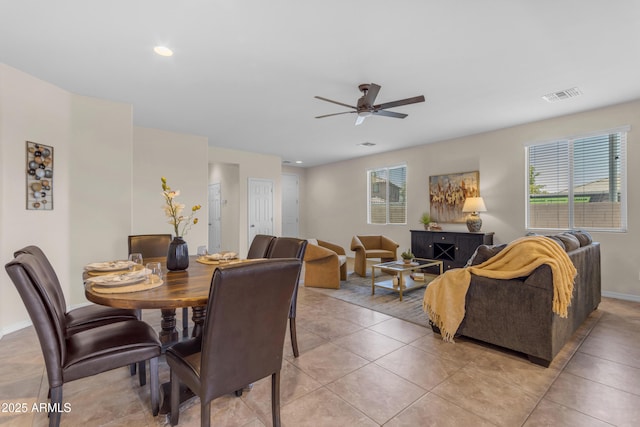 11159 E Sebring Ave, Mesa, AZ 85212 - dining area featuring ceiling fan, light tile patterned flooring, and recessed lighting