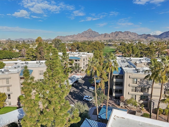 birds eye view of property featuring a mountain view