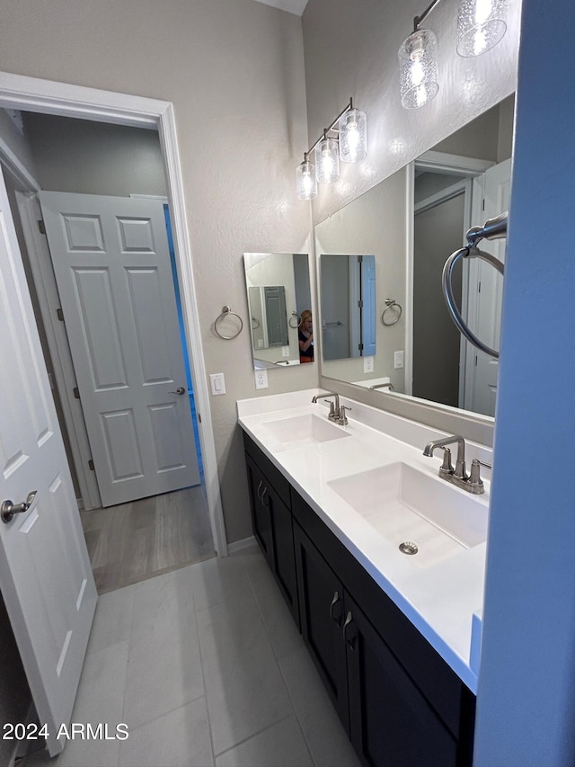 bathroom featuring tile patterned floors and vanity